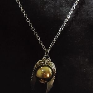 Elegant Silver and Gold Winged Pendant Necklace